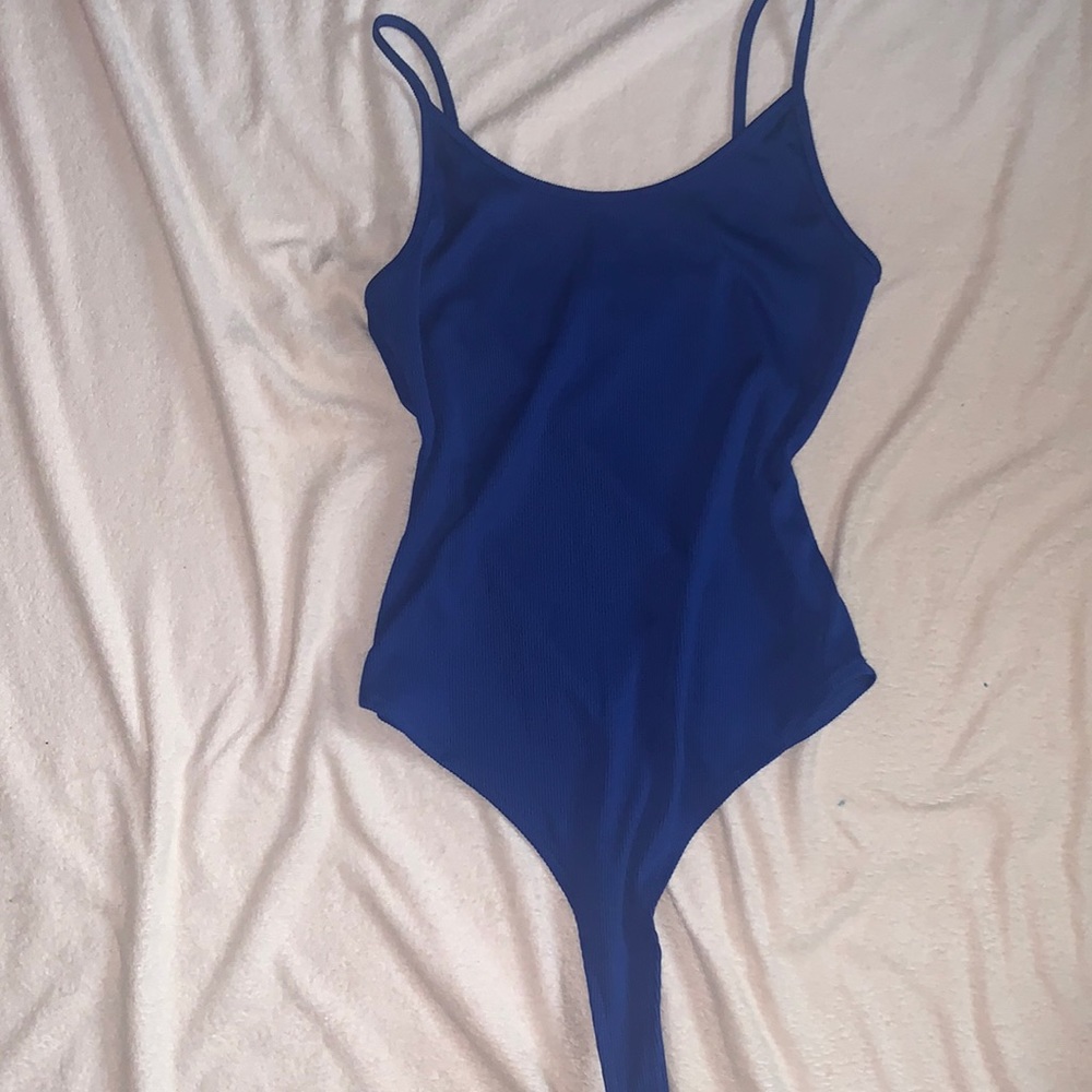 Dark blue body suit worn about 4 or 5 times